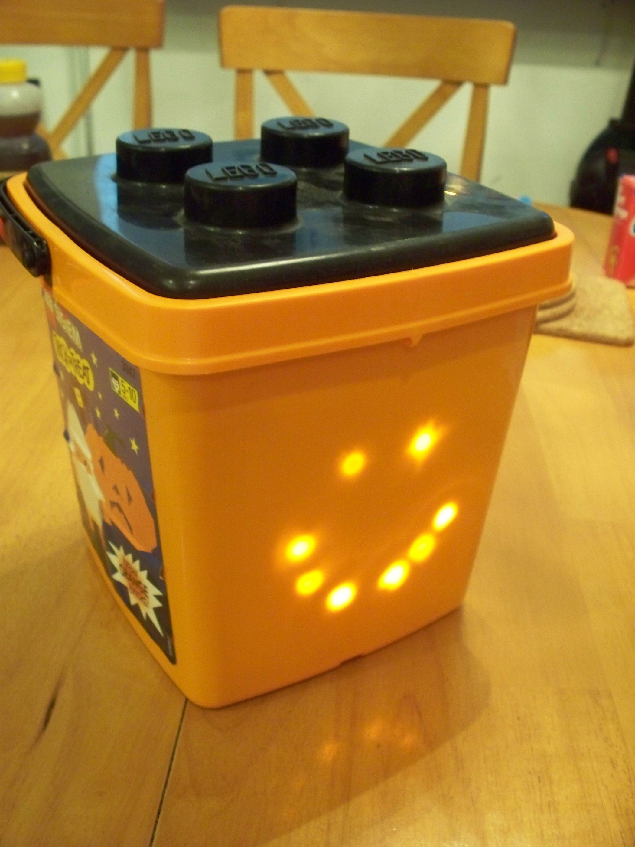 LEGO Bucket Turned &quot;scary&quot; Pumpkin Head (and Candy Collecting Bucket