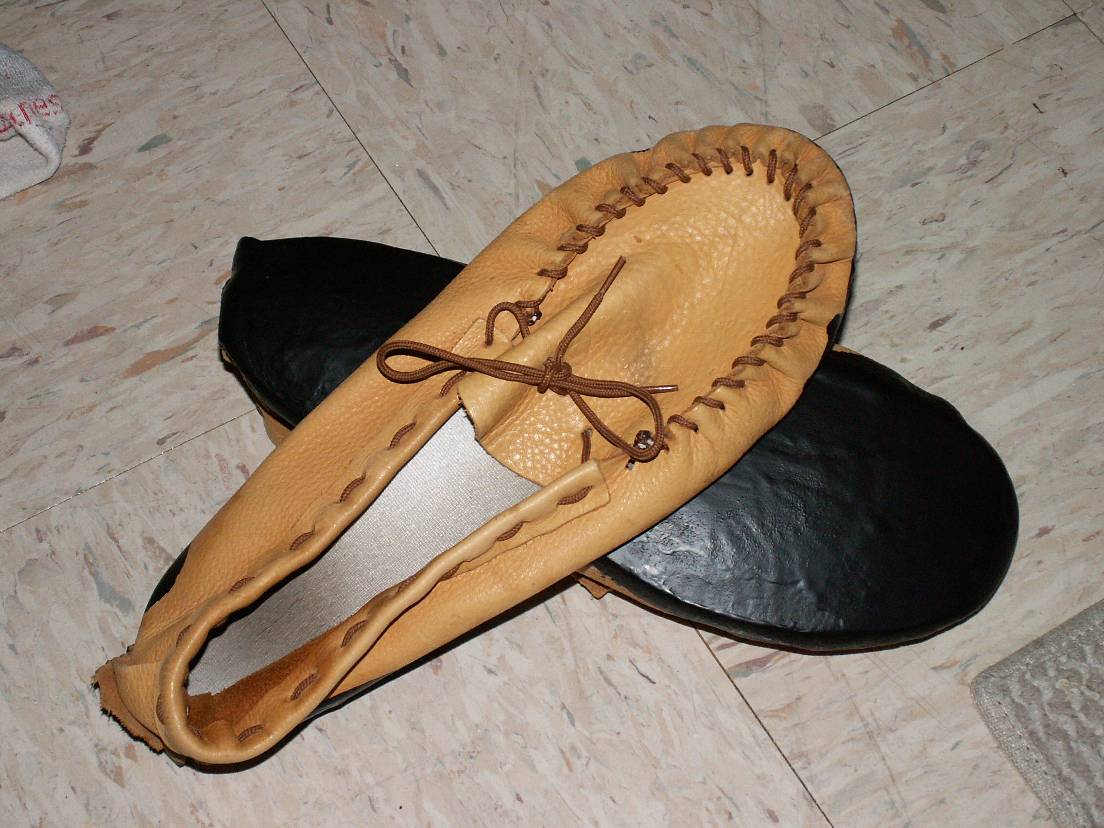 attaching soles to moccasins