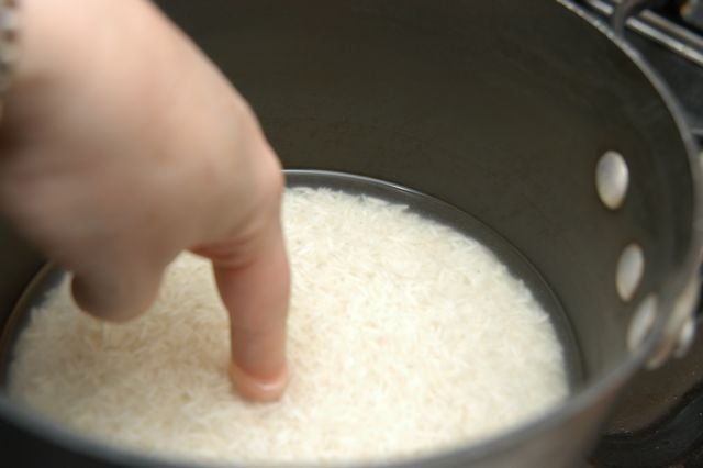 dip finger in rice
