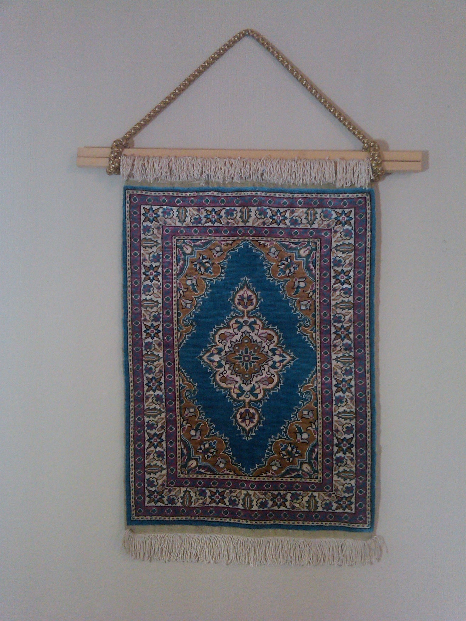 Hanging Fringed Rug on Wall