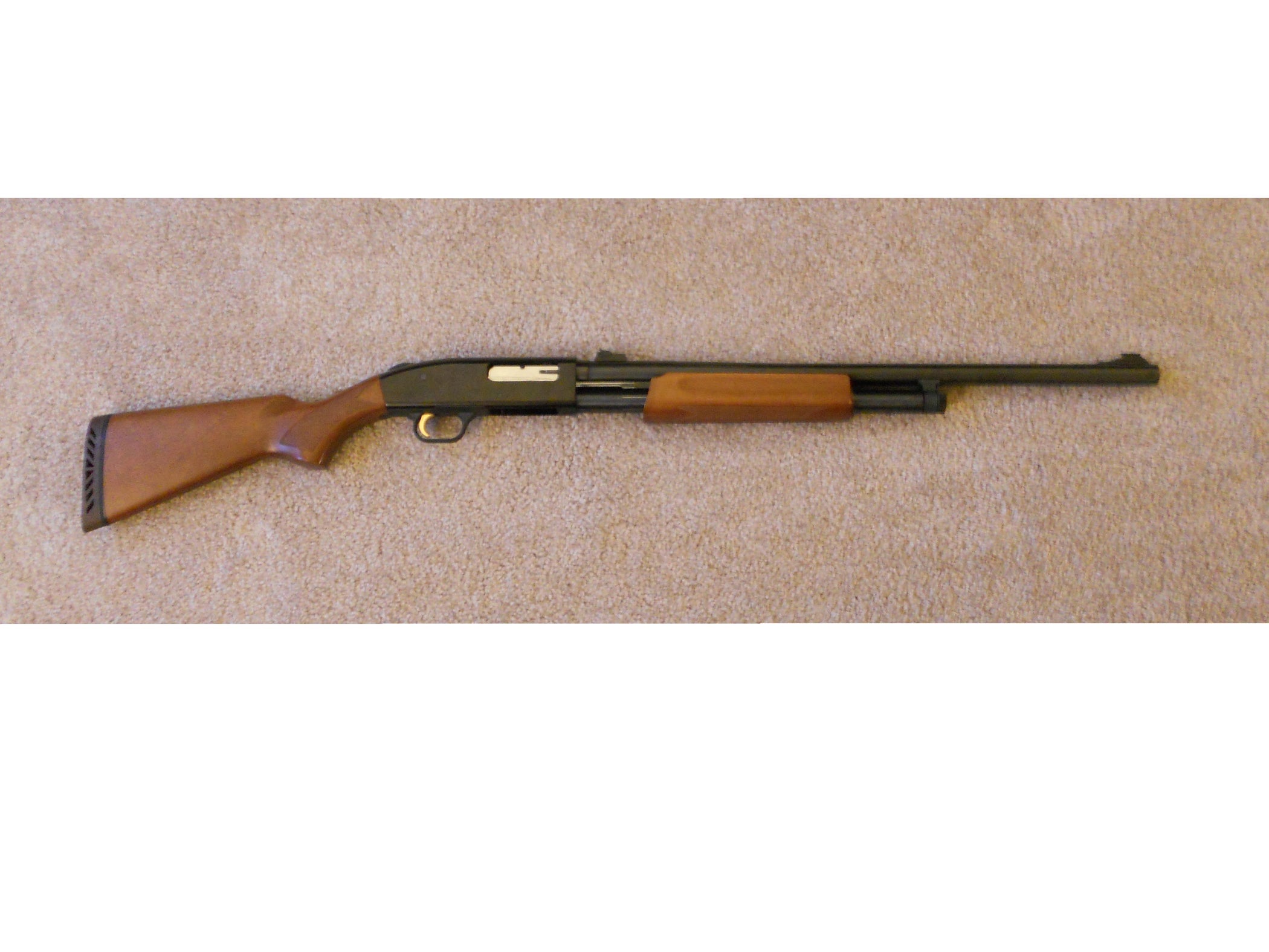 How to Disassemble a Mossberg 500 Series Shotgun 9 Steps